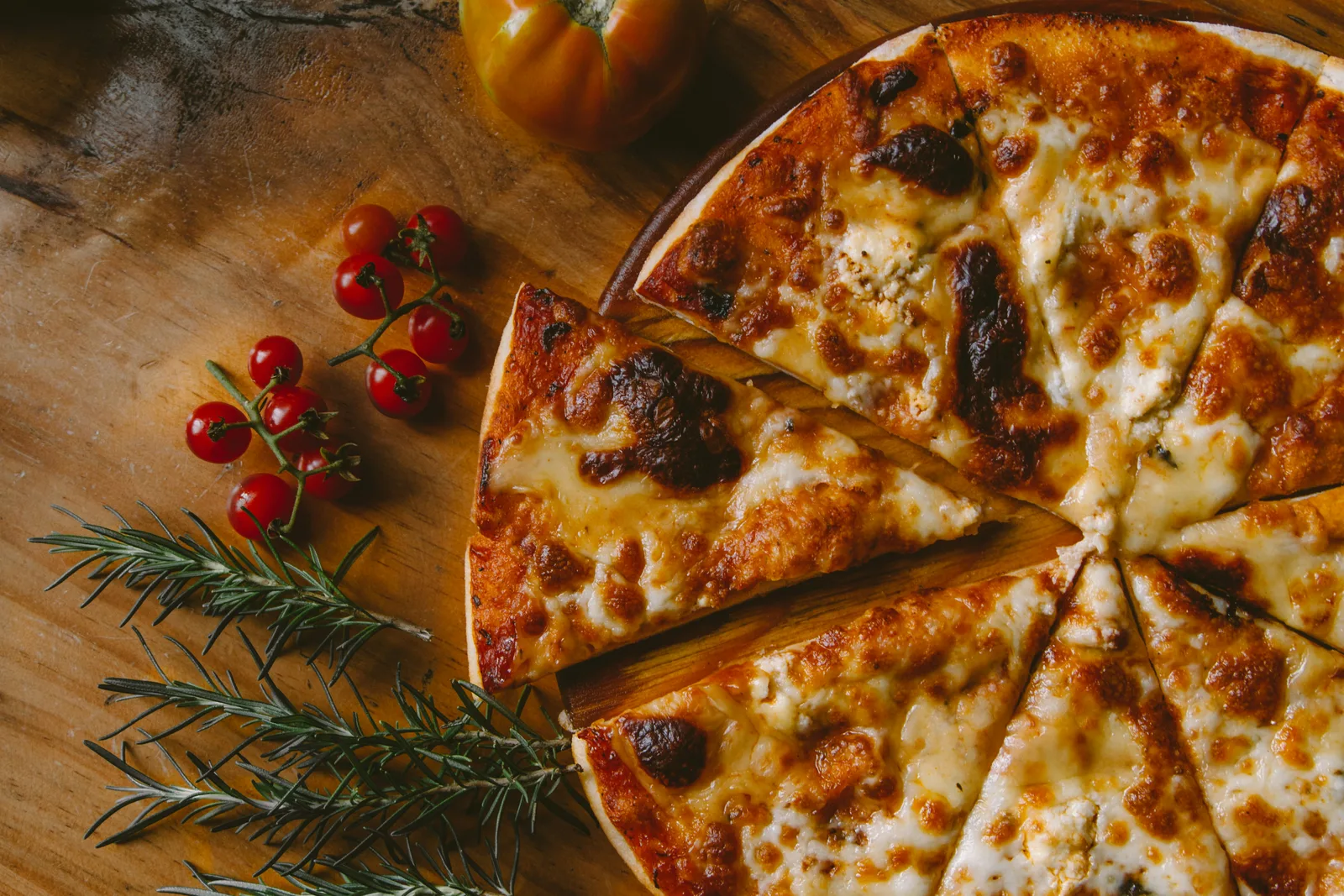 Wood-fired pizza fresh from the oven at Smoke & Sizzle3